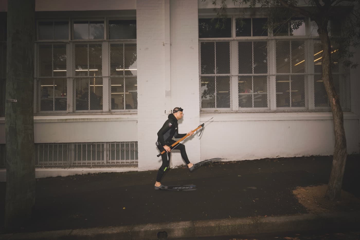 Member with kit outside a clinical building